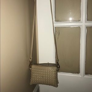 Tan cross body bag